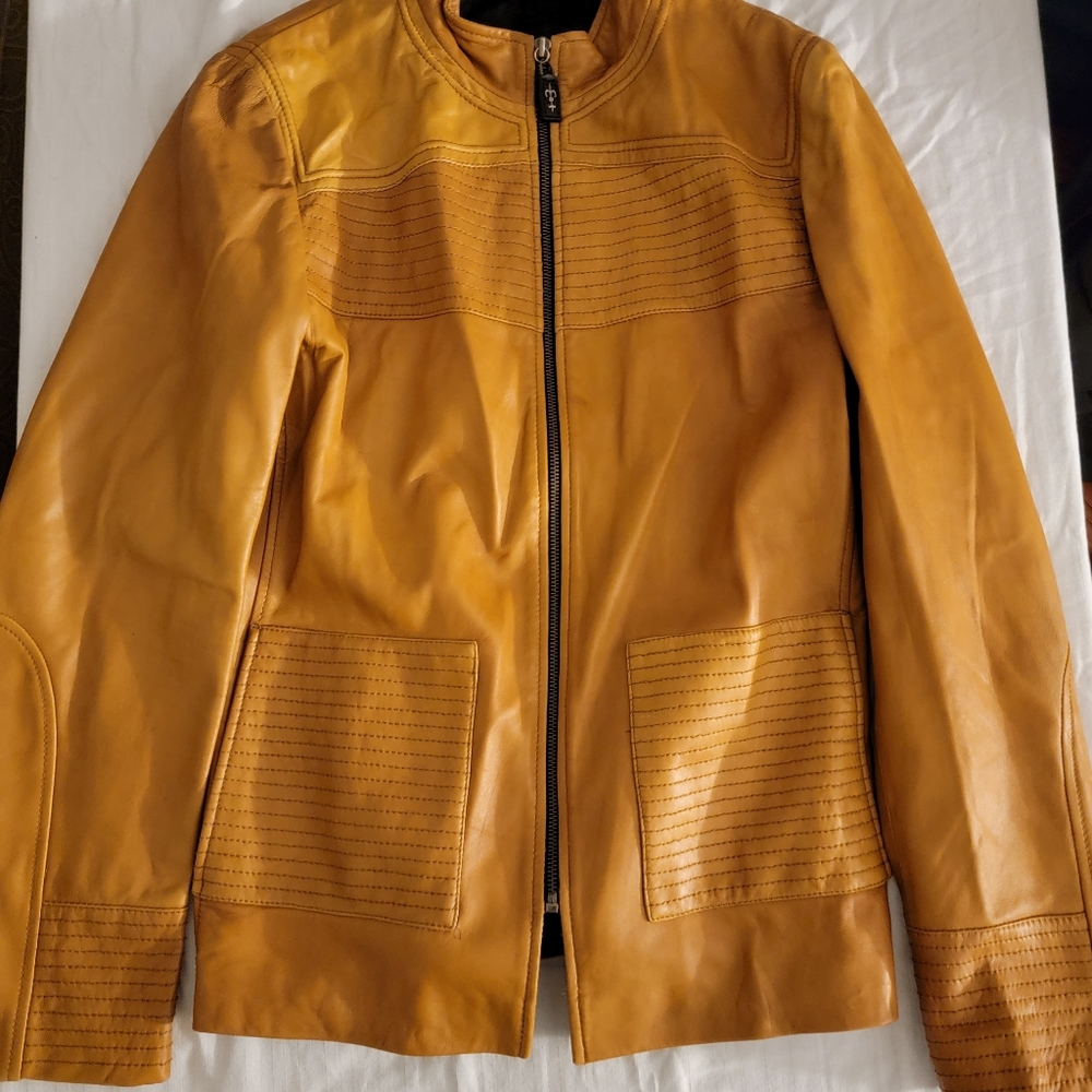 Royal Underground 100% leather. Suede blazer and the inside is silk